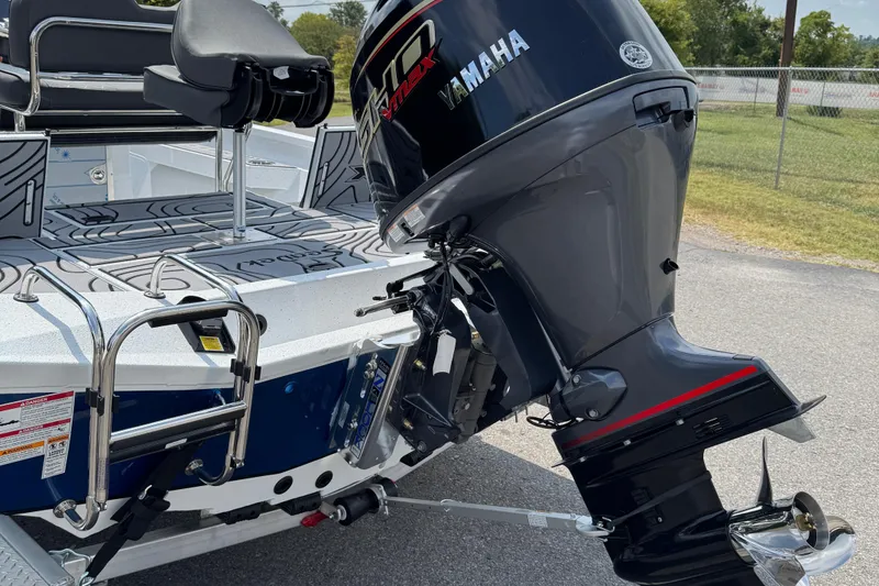 Slide: The Image of 2026 Xpress H20B Bay boat with Yamaha outboard motor and rear seating. - 8