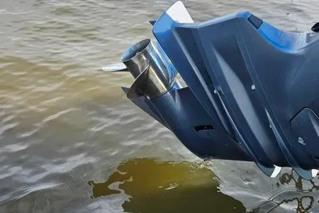 Slide: The Image of Edgewater 188CC 2021 boat motor in water, showcasing propeller and sleek design. - 11