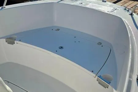 Slide: The Image of 2021 Edgewater 188CC boat interior, showcasing spacious seating and storage area. - 15