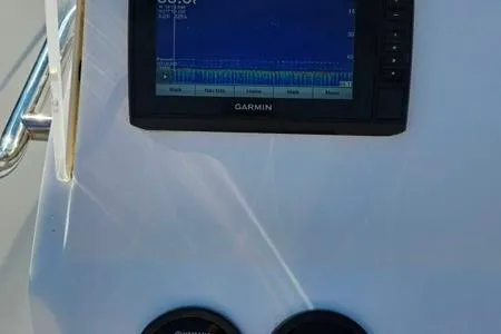 Slide: The Image of Garmin display on 2021 Edgewater 188CC boat dashboard, showing navigation data. - 5