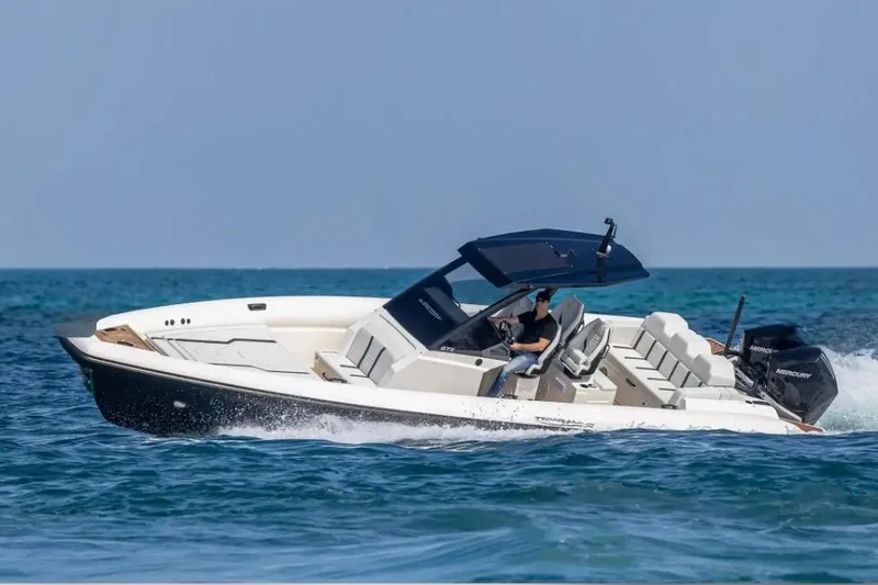 Slide: The Image of 2025 Technohull GTX speedboat cruising on open water. - 21