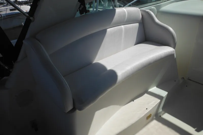 Slide: The Image of White seating area on a 2000 Rinker 330 Fiesta Vee boat. - 12