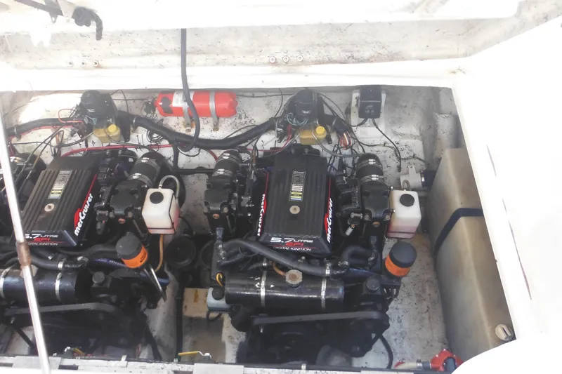 Slide: The Image of Engine compartment of 2000 Rinker 330 Fiesta Vee with dual MerCruiser engines. - 31
