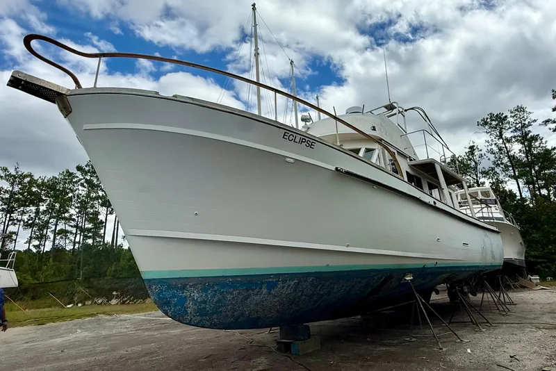 The Image of 1982 Albin 49 Trawler "Eclipse" on dry dock, cloudy sky background. - 0