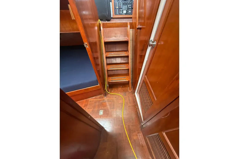 Slide: The Image of Interior of 1982 Albin 49 Trawler with wooden stairs and cabin details. - 34