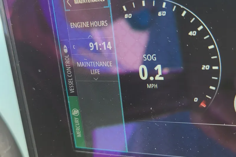 Slide: The Image of Digital display of 2023 Pathfinder 2500 Hybrid showing engine hours and speed. - 21