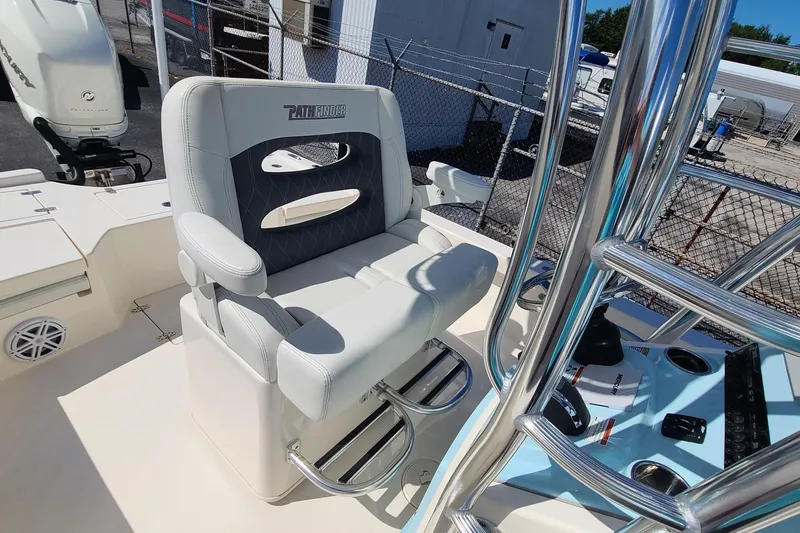 Slide: The Image of 2023 Pathfinder 2500 Hybrid boat seat with sleek design and chrome accents. - 26