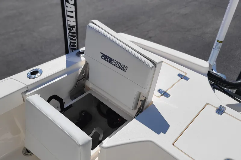 Slide: The Image of 2023 Pathfinder 2500 Hybrid boat storage compartment open on deck. - 31
