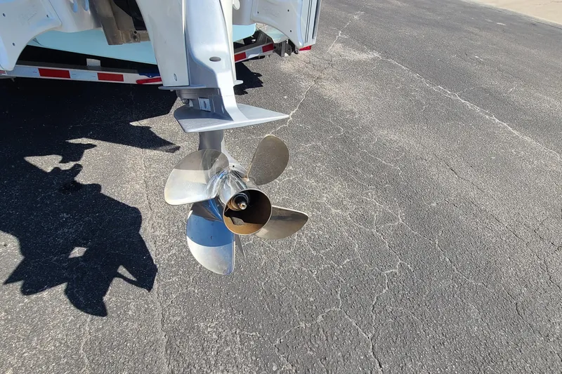 Slide: The Image of Propeller of 2023 Pathfinder 2500 Hybrid boat on asphalt surface. - 8