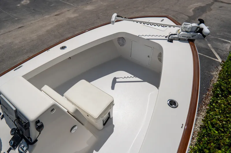 Slide: The Image of 2022 Croswait Custom Carolina 21 boat deck with seating and trolling motor. - 18