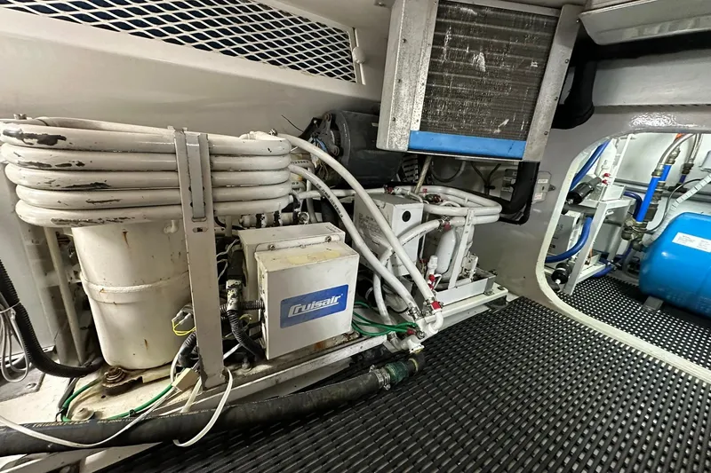 Slide: The Image of Engine room of 1998 Viking 54 Motor Yacht with Cruisair system and coiled pipes. - 50