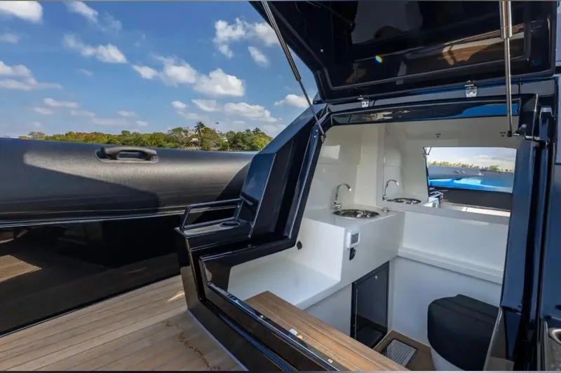 Slide: The Image of 2025 Technohull 38 Gran boat interior with sleek kitchenette and modern design. - 25