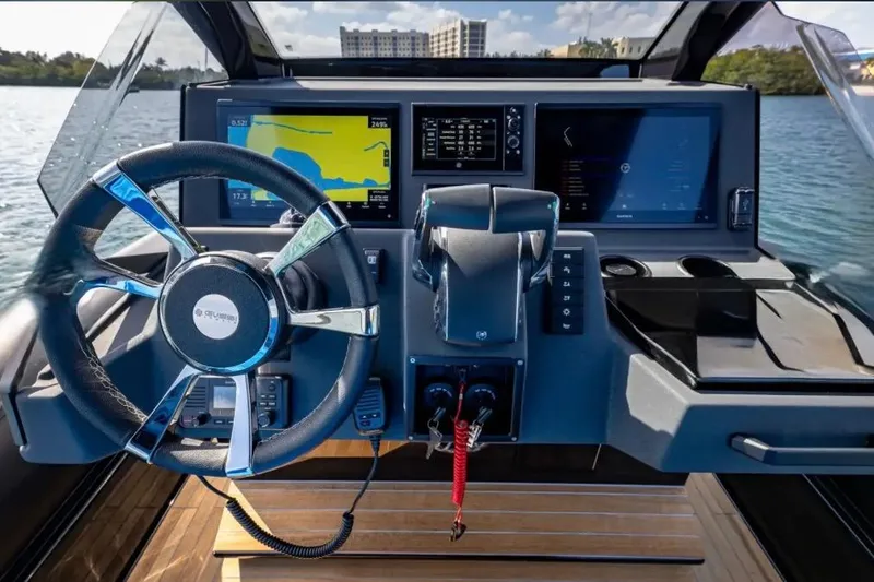 Slide: The Image of Cockpit of 2025 Technohull 38 Gran with advanced navigation displays and steering wheel. - 27