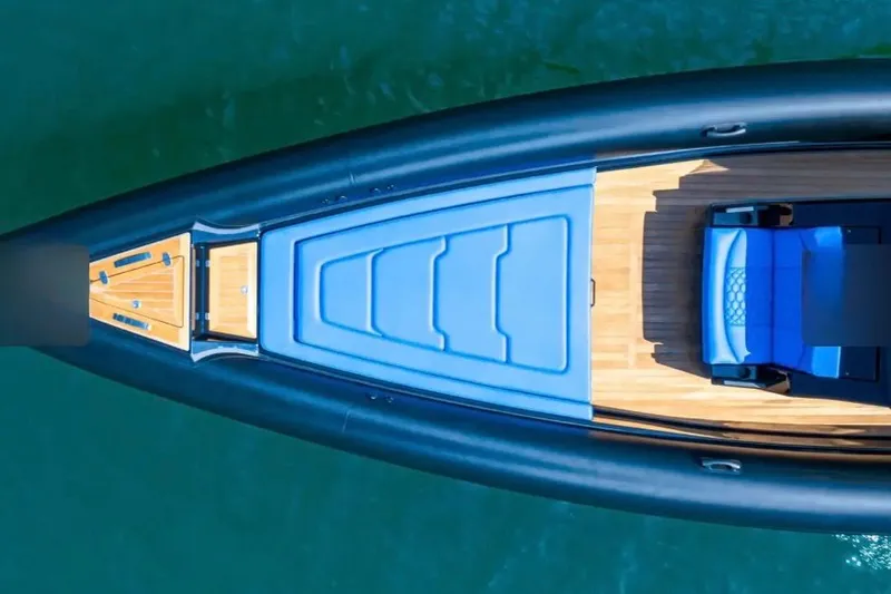 Slide: The Image of Aerial view of 2025 Technohull 38 Gran yacht with sleek design and blue accents. - 3