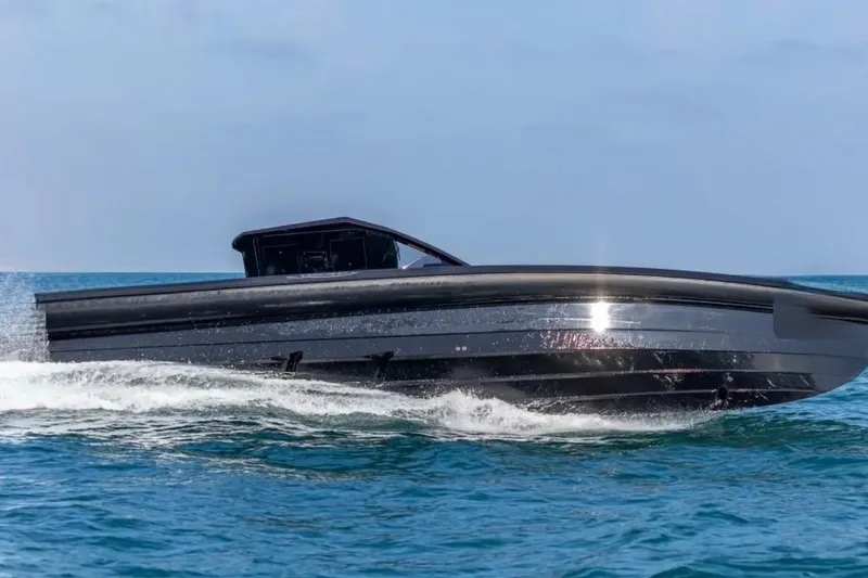 Slide: The Image of 2025 Technohull 38 Gran speedboat cruising on open water. - 6