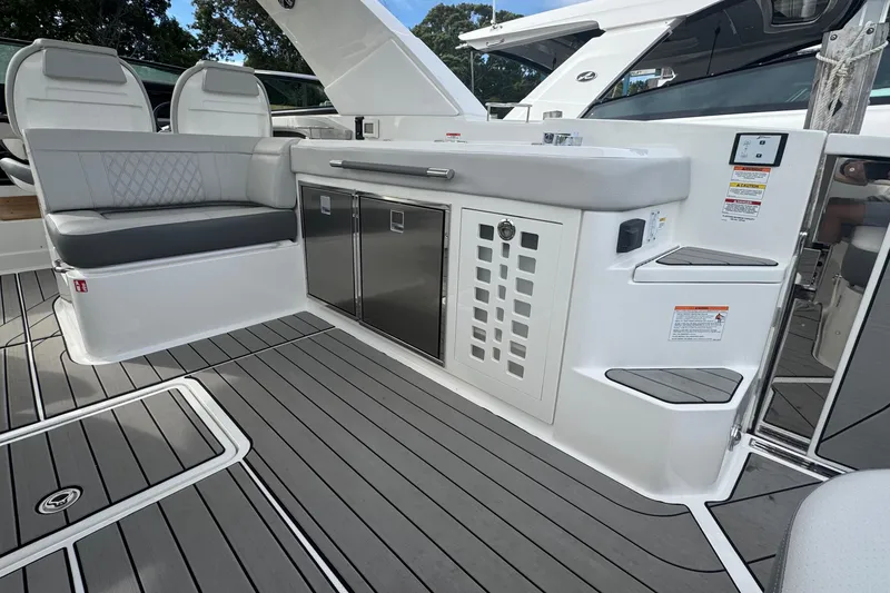 Slide: The Image of 2025 Sea Ray SLX 400 Outboard interior with seating and sleek design. - 20
