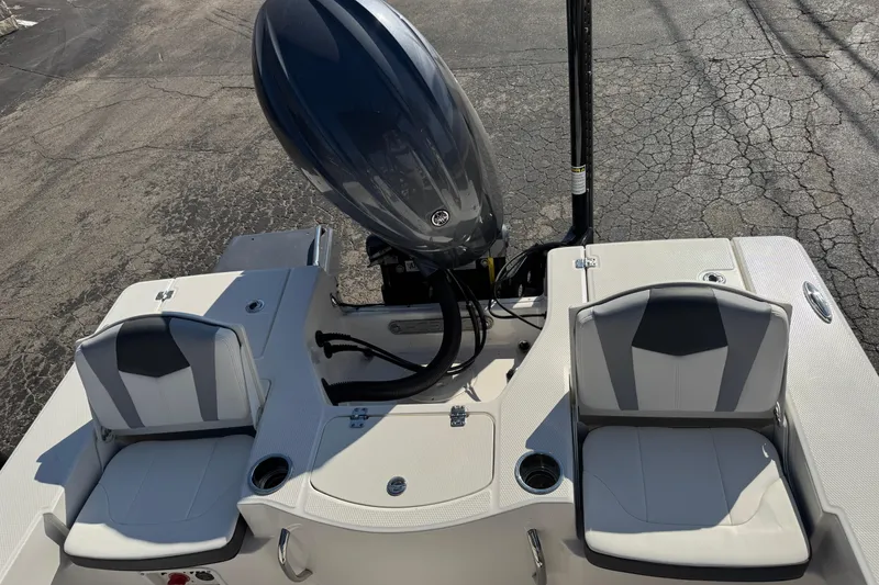 Slide: The Image of 2023 Robalo 206 Cayman boat with dual seats and outboard motor. - 39