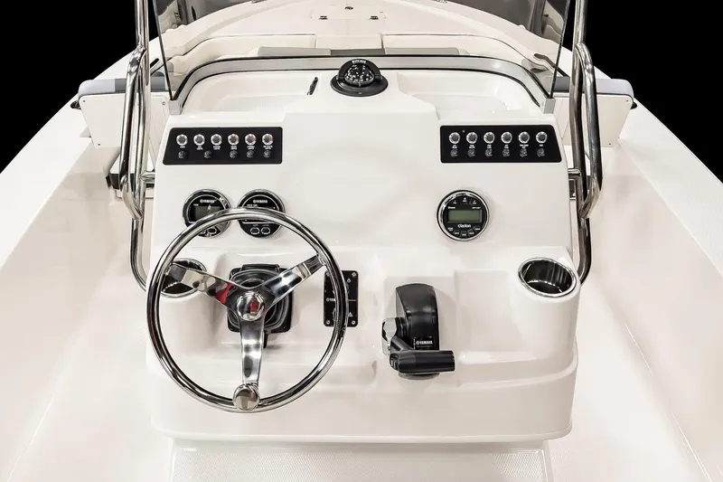 Slide: The Image of Manufacturer Provided Image: 2023 Robalo 206 Cayman boat dashboard with steering wheel and control panel. - 53
