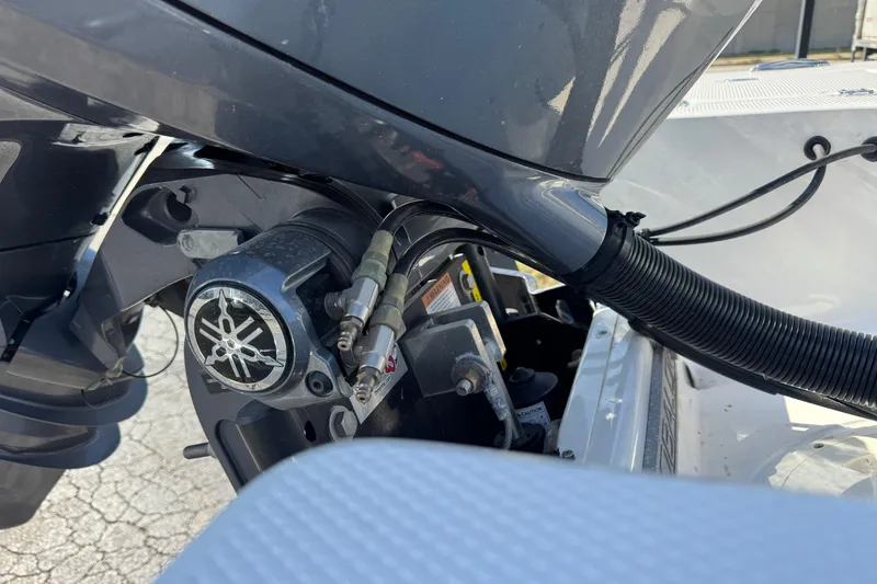 Slide: The Image of 2023 Robalo 206 Cayman boat engine close-up with Yamaha components. - 8