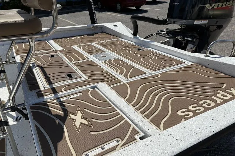 Slide: The Image of 2022 Xpress H22B Bay boat deck with custom non-slip flooring design. - 8