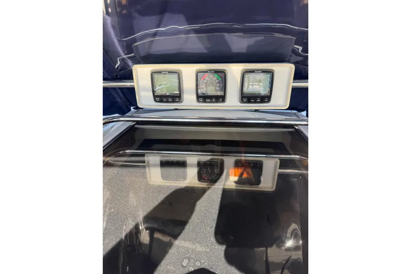 Slide: The Image of Control panel of a 2005 Sabre 386 yacht with navigation instruments. - 10