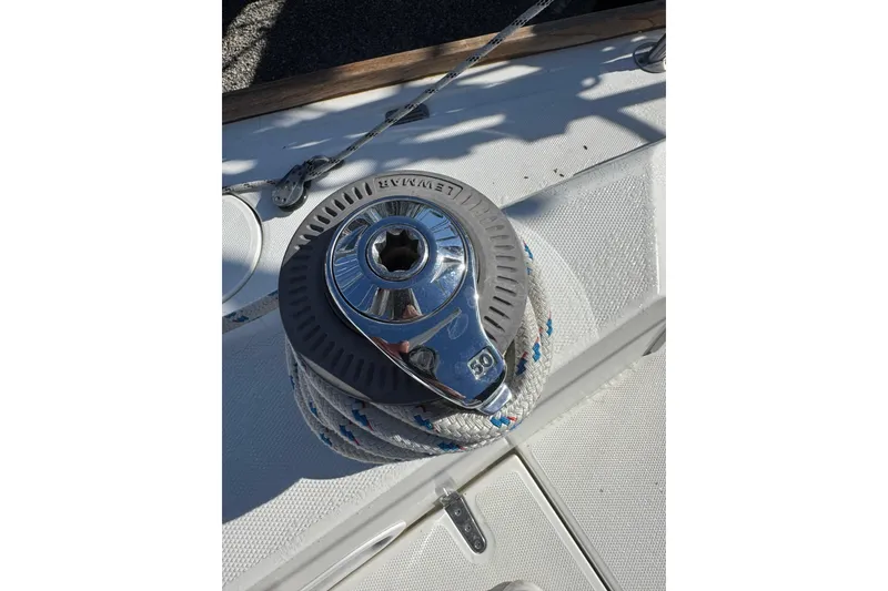 Slide: The Image of Close-up of a winch on a 2005 Sabre 386 sailboat deck. - 33
