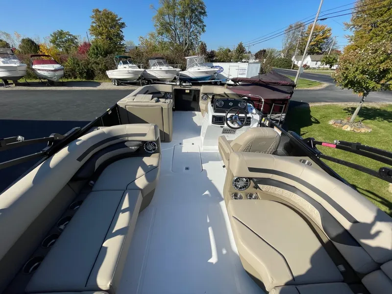 Slide: The Image of 2023 Hurricane FunDeck 2360 SBC boat with spacious seating and modern design. - 39