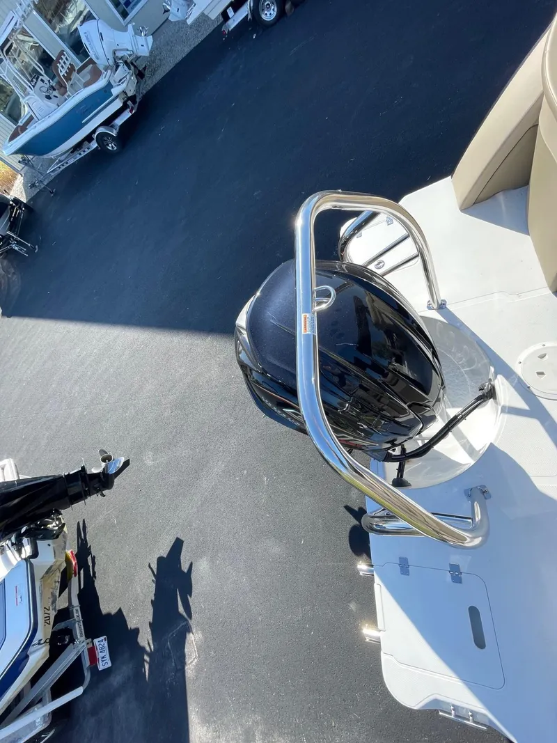 Slide: The Image of 2023 Hurricane FunDeck 2360 SBC boat with sleek design and modern features. - 42