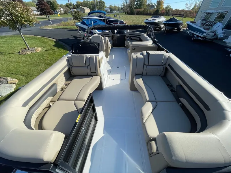 Slide: The Image of 2023 Hurricane FunDeck 2360 SBC boat with spacious seating and modern design. - 8