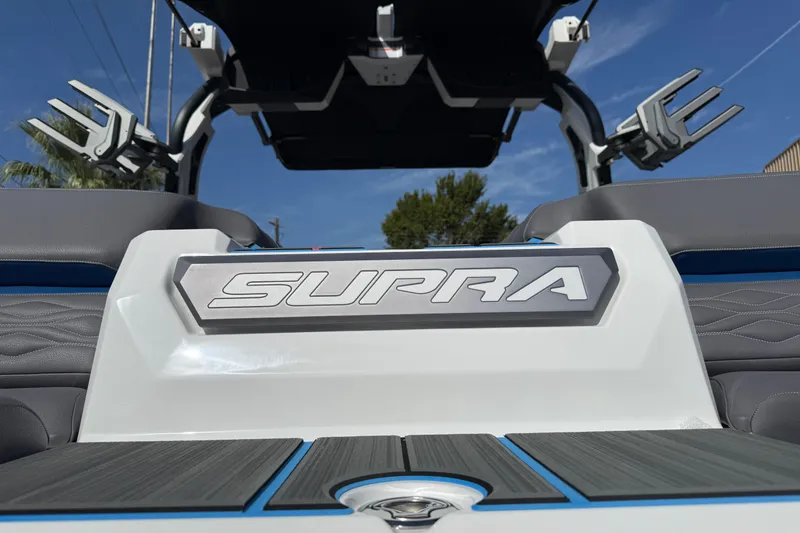 Slide: The Image of 2026 Supra SA 450 boat interior with logo, showcasing sleek design and modern features. - 16