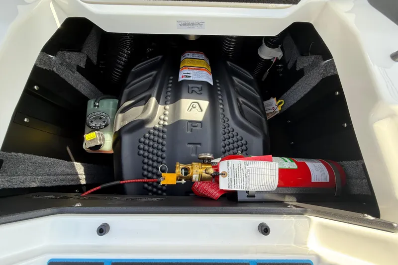 Slide: The Image of Engine compartment of 2026 Supra SA 450 boat with fire extinguisher and components. - 20