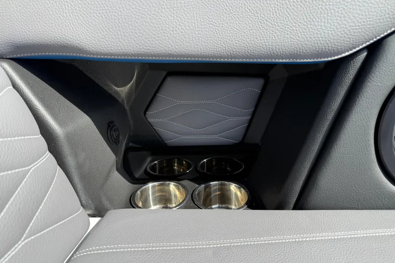 Slide: The Image of 2026 Supra SA 450 interior with sleek leather design and integrated cup holders. - 22