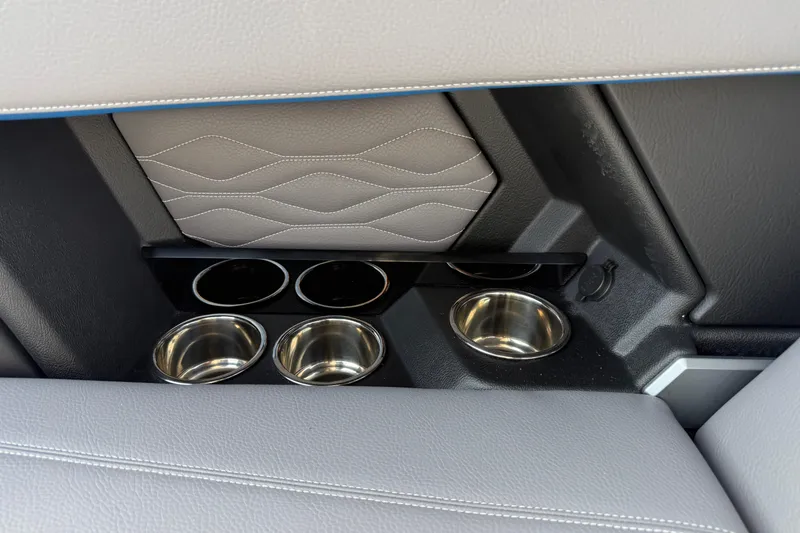 Slide: The Image of 2026 Supra SA 450 interior cup holders with sleek, modern design and premium materials. - 25