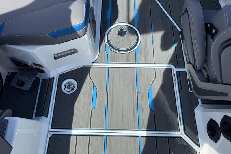 Slide: The Image of 2026 Supra SA 450 boat interior with sleek, modern flooring and comfortable seating. - 39