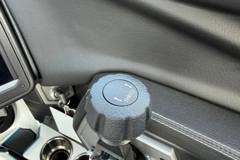Slide: The Image of Throttle control knob in 2026 Supra SA 450 boat cockpit. - 45