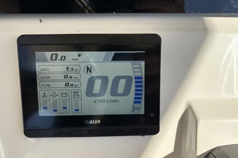 Slide: The Image of Yamaha display on 2026 Scout 240 XSF showing speed, fuel usage, and engine metrics. - 20