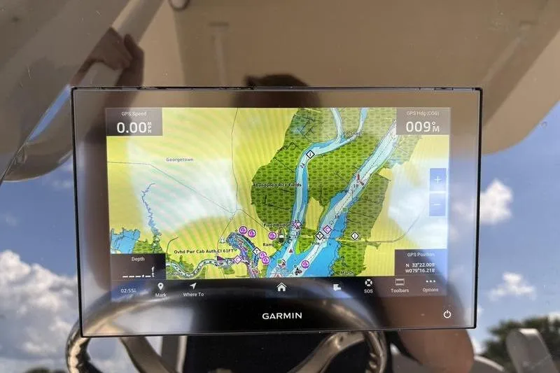 Slide: The Image of Garmin GPS display on 2026 Scout 240 XSF boat, showing detailed navigation map. - 21