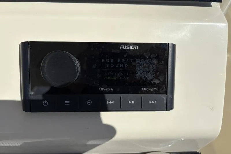 Slide: The Image of Fusion audio system on 2026 Scout 240 XSF boat dashboard. - 23