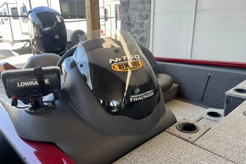 Slide: The Image of 2021 Bass Tracker Pro Team 195 TXW TE boat interior with Lowrance device. - 12