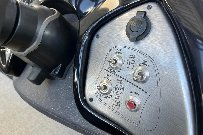 Slide: The Image of Control panel of 2021 Bass Tracker Pro Team 195 TXW TE boat. - 15