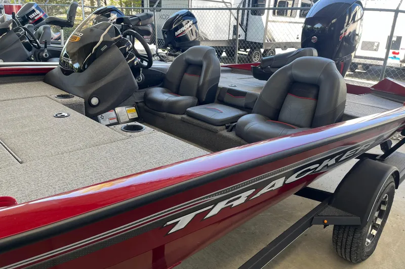 Slide: The Image of 2021 Bass Tracker Pro Team 195 TXW TE boat with dual seats and steering console. - 5