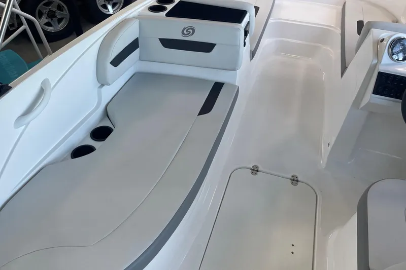 Slide: The Image of 2023 Hurricane SunDeck Sport 185 OB interior with seating and cup holders. - 10