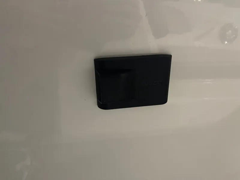 Slide: The Image of Black component on 2022 Hurricane SunDeck Sport 205 IO boat surface. - 13