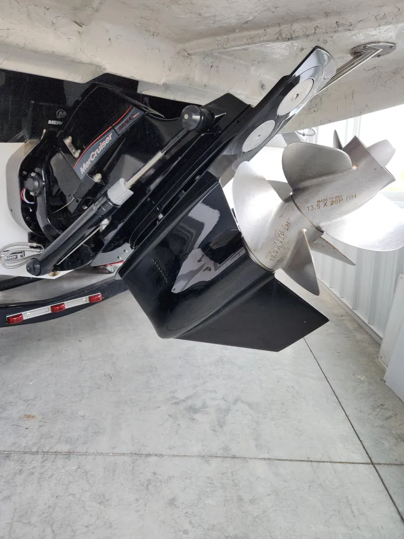 Slide: The Image of 2022 Hurricane SunDeck Sport 205 IO boat propeller and outdrive. - 3
