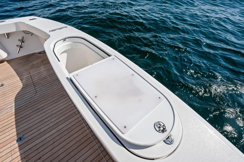 Slide: The Image of 2017 Viking 62 Enclosed Bridge yacht deck with ocean view. - 22