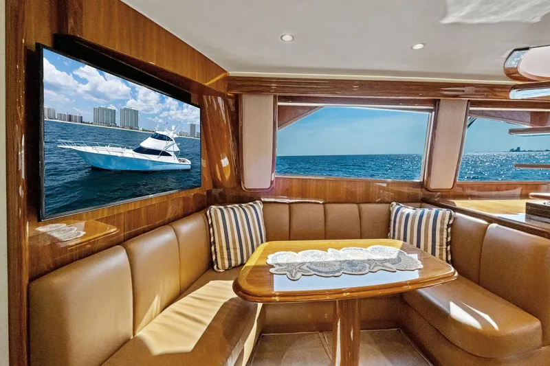 Slide: The Image of Luxurious interior of 2017 Viking 62 Enclosed Bridge yacht with ocean view. - 32