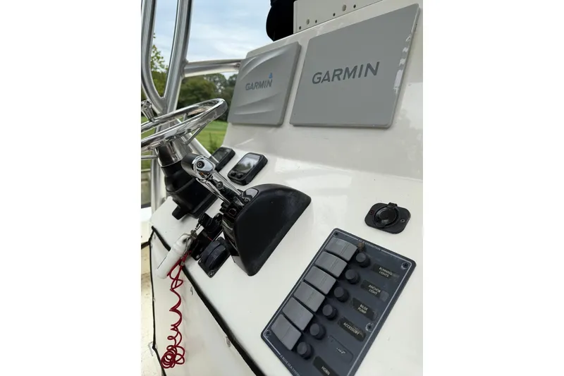 Slide: The Image of Control panel of 2014 Privateer ROAMER II boat with Garmin navigation system. - 5