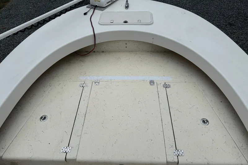 Slide: The Image of Bow deck of 2014 Privateer ROAMER II boat with storage compartments. - 8