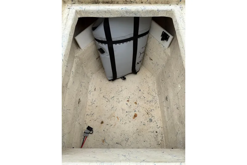 Slide: The Image of Storage compartment of 2014 Privateer ROAMER II boat with equipment inside. - 9