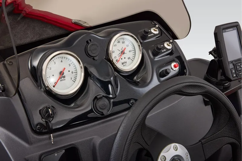 Slide: The Image of Manufacturer Provided Image: 2026 Tracker Super Guide V-16 SC boat interior with two gray seats and steering console. - 40